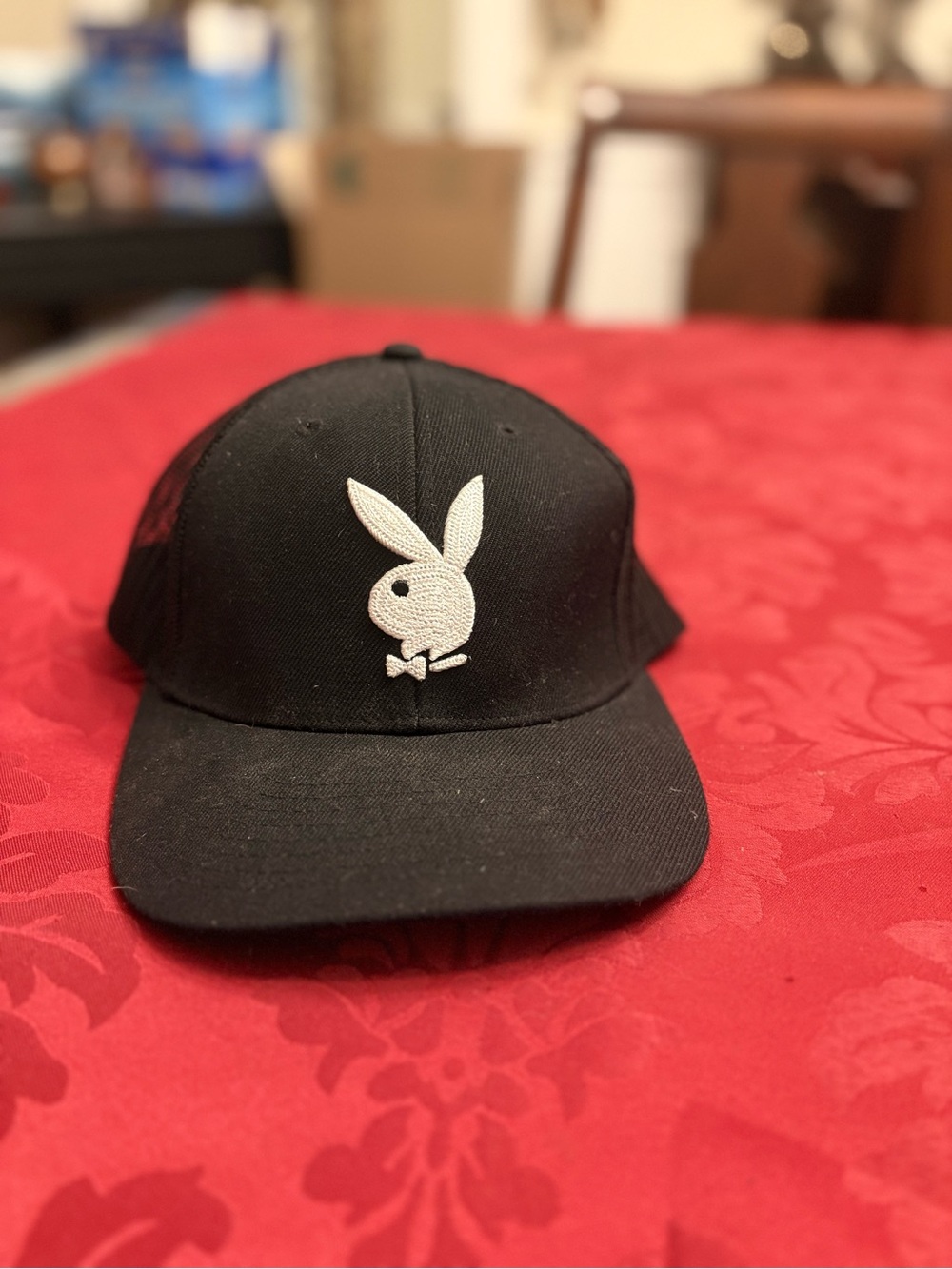 Black playboy trucker hat